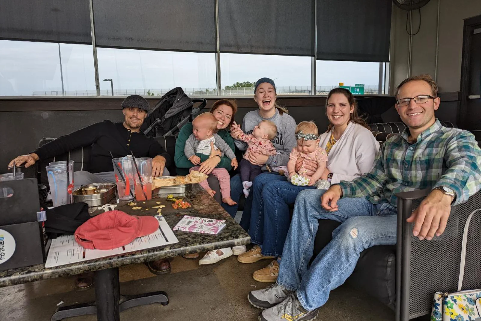 photography of five people near outdoor during daytime